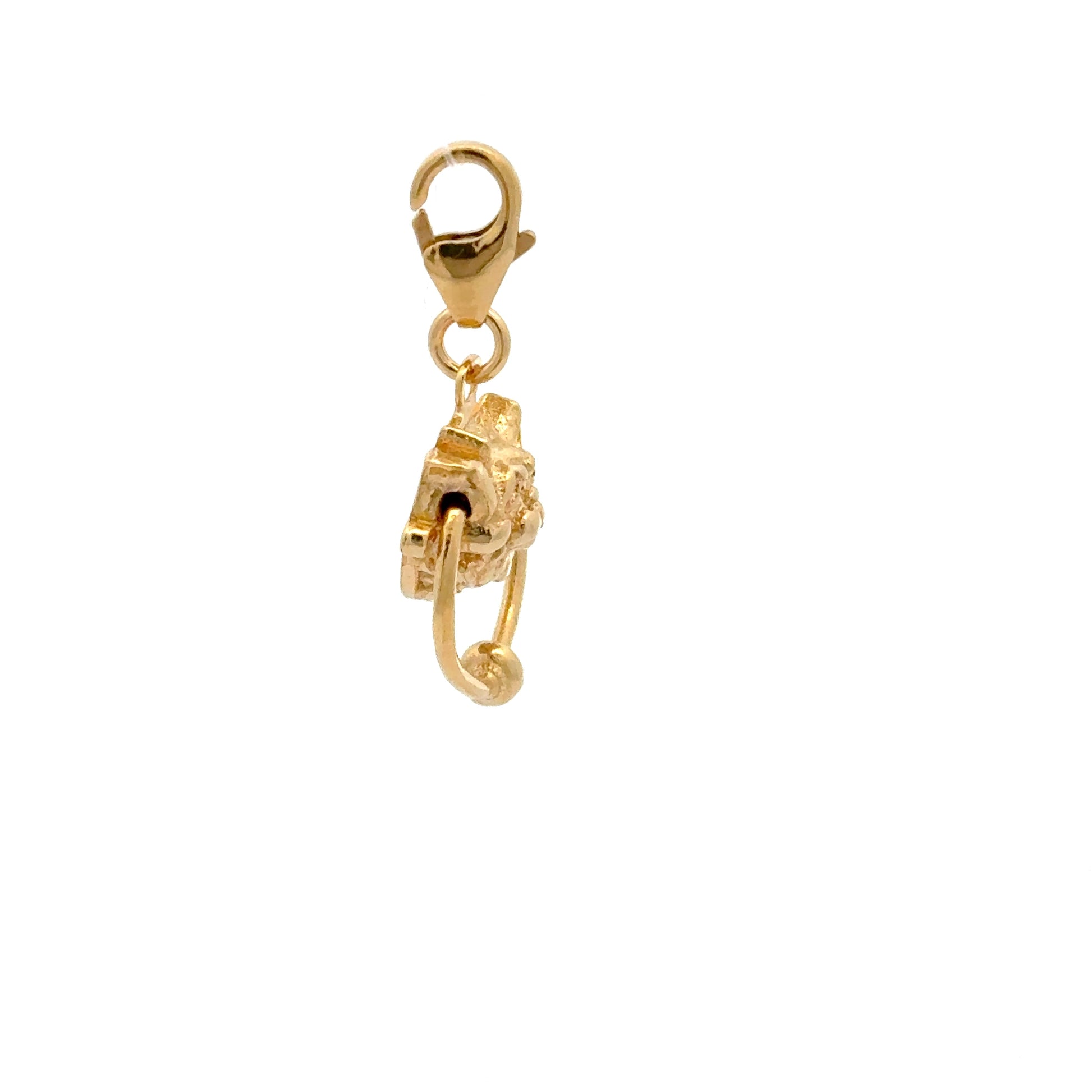 Licensed To Charm gold vermeil Labyrinth Right Door Knocker Charm – styled on a bracelet, showing how the movable ring and whimsical features catch the light.