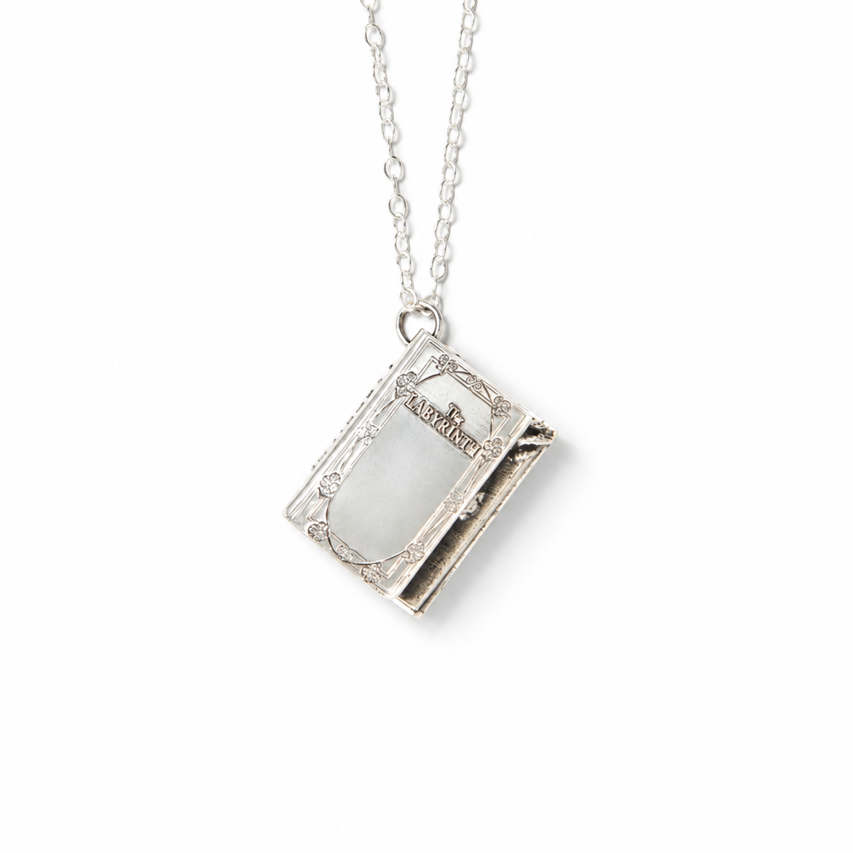 Labyrinth Story Book charm necklace with an engraved book pendant on a chain