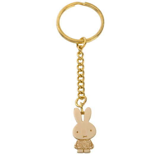 Licensed To Charm Miffy Daisy Delight Bag Charm featuring Miffy in a daisy dress with a gold-toned split ring. A playful accessory for Miffy fans and bag lovers.