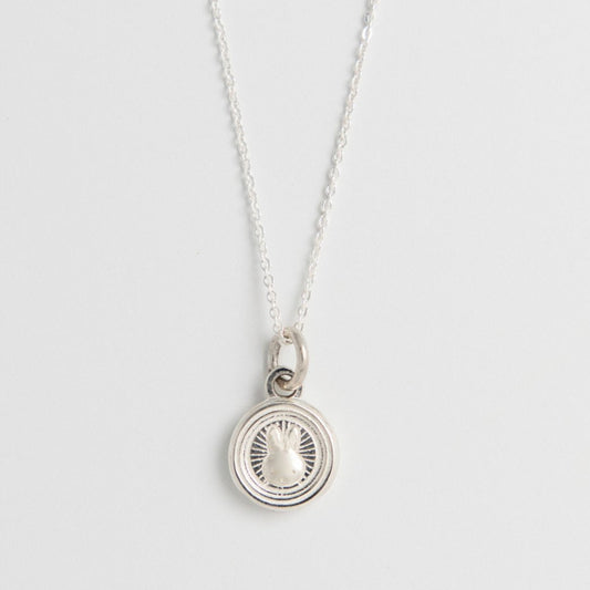 Close-up of Miffy Mini Rabbit Double Coin Necklace in recycled sterling silver, showcasing Miffy’s face in a traditional-inspired coin design on a fine chain.