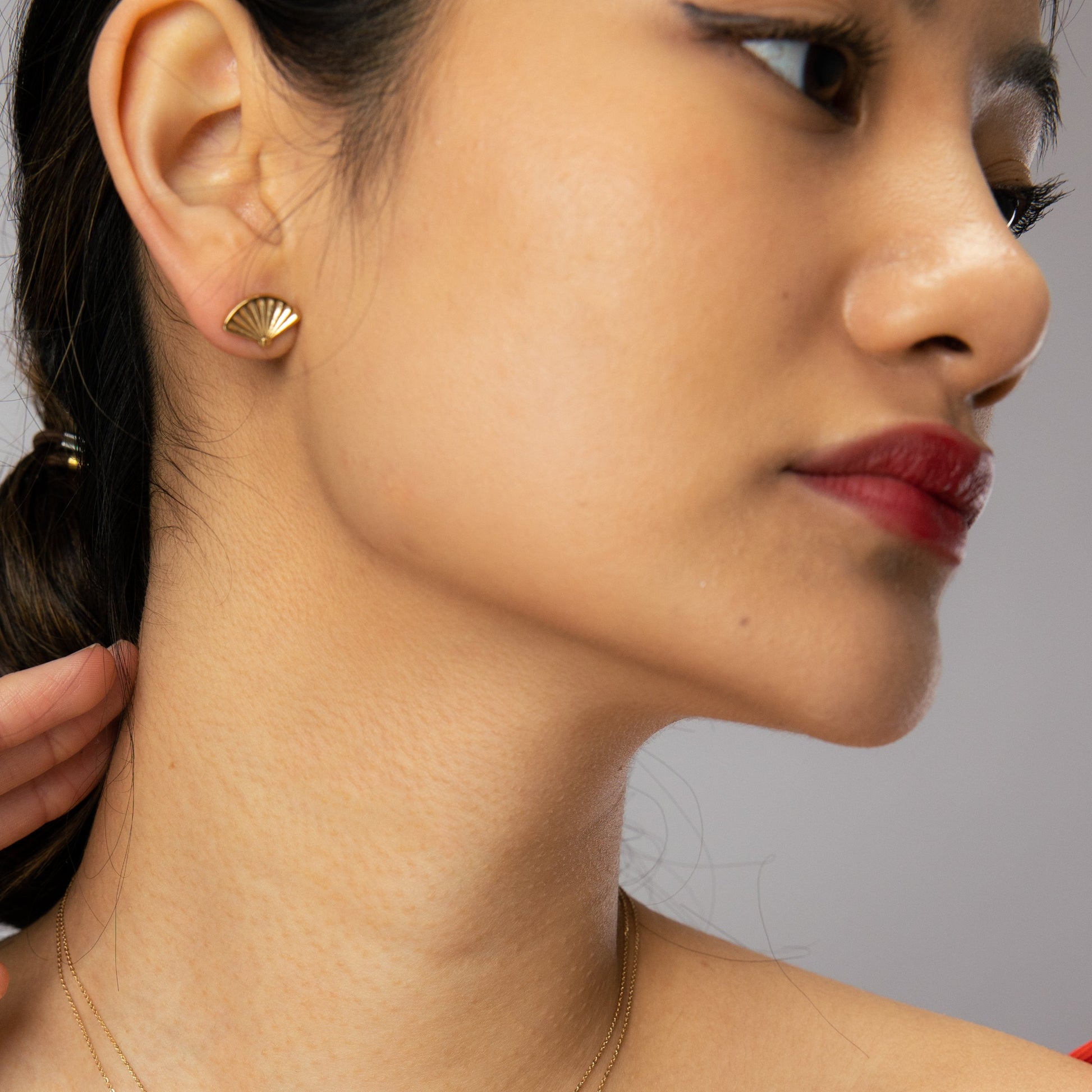 Licensed To Charm Miffy Fan Stud Earrings displayed on ears, showcasing the elegant gold vermeil finish and symbolic fan-inspired charm.