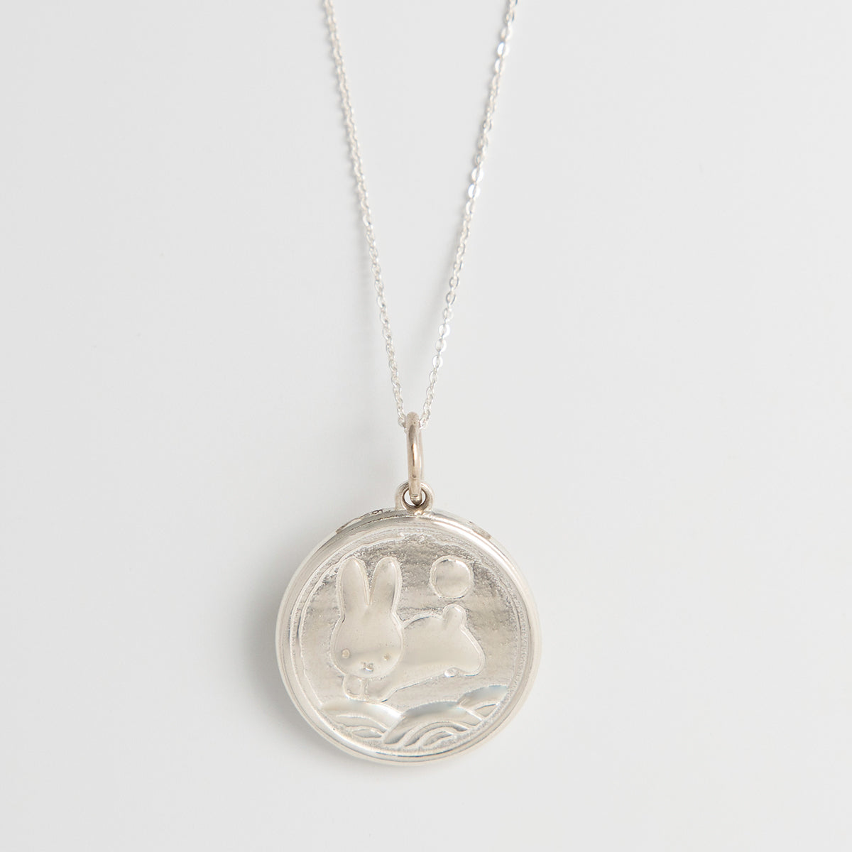 Miffy New Year Medallion Necklace in sterling silver, featuring a double-sided design with Miffy leaping over moonlit fields and a lucky coin motif.