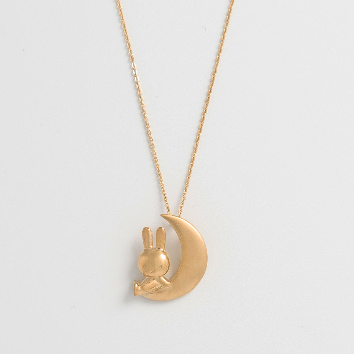 Licensed To Charm Miffy Moon Necklace – close-up of Miffy sitting on crescent moon