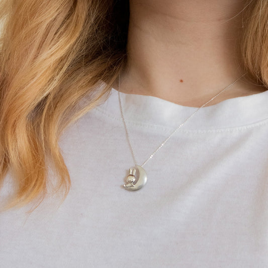 Licensed To Charm Handcrafted Miffy & The Moon Necklace in sterling silver, showcasing Miffy on a crescent moon. A timeless gift inspired by Dick Bruna's iconic character.