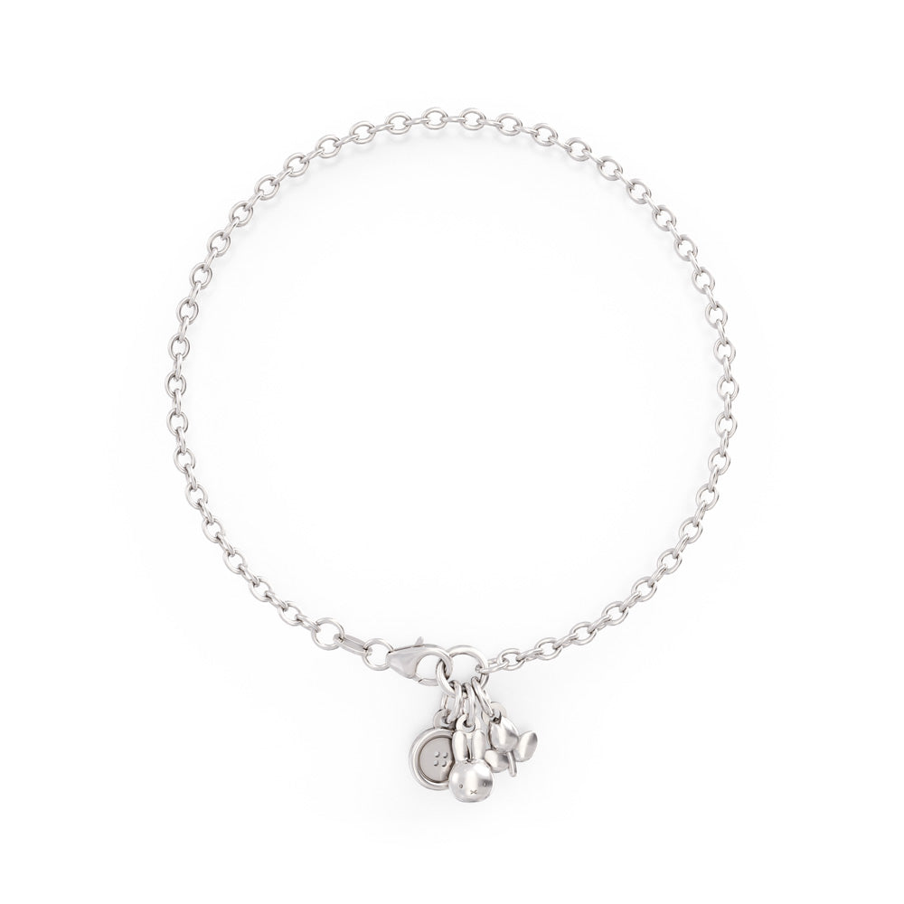 Licensed To Charm Miffy Charm Bracelet in sterling silver, featuring Miffy head, button, and tulip charms. Handcrafted from recycled silver, perfect for gifting
