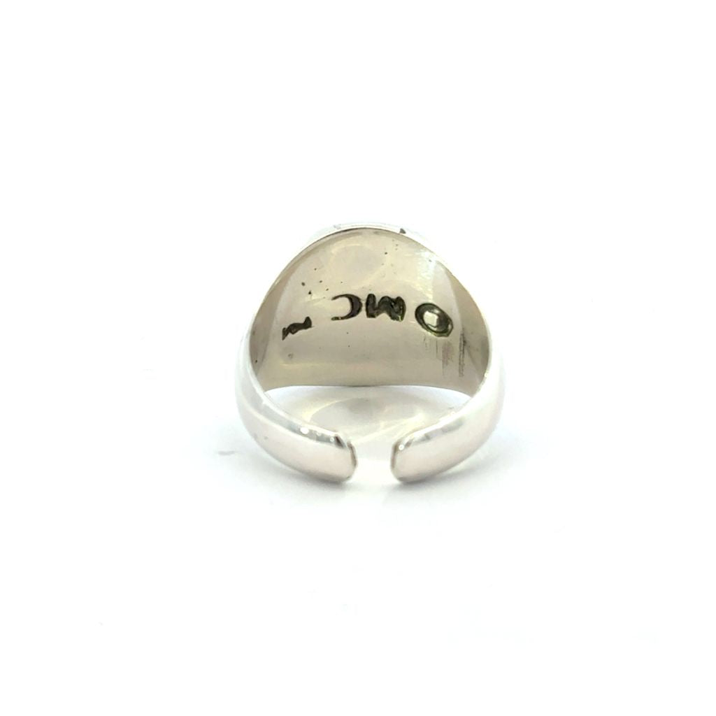 Licensed To Charm adjustable sterling silver Moomin Crest ring showing open band and polished interior.