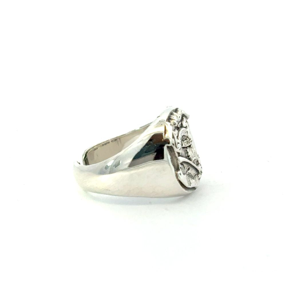 Licensed To Charm Moomin Crest sterling silver signet ring photographed from the side showing polished band.