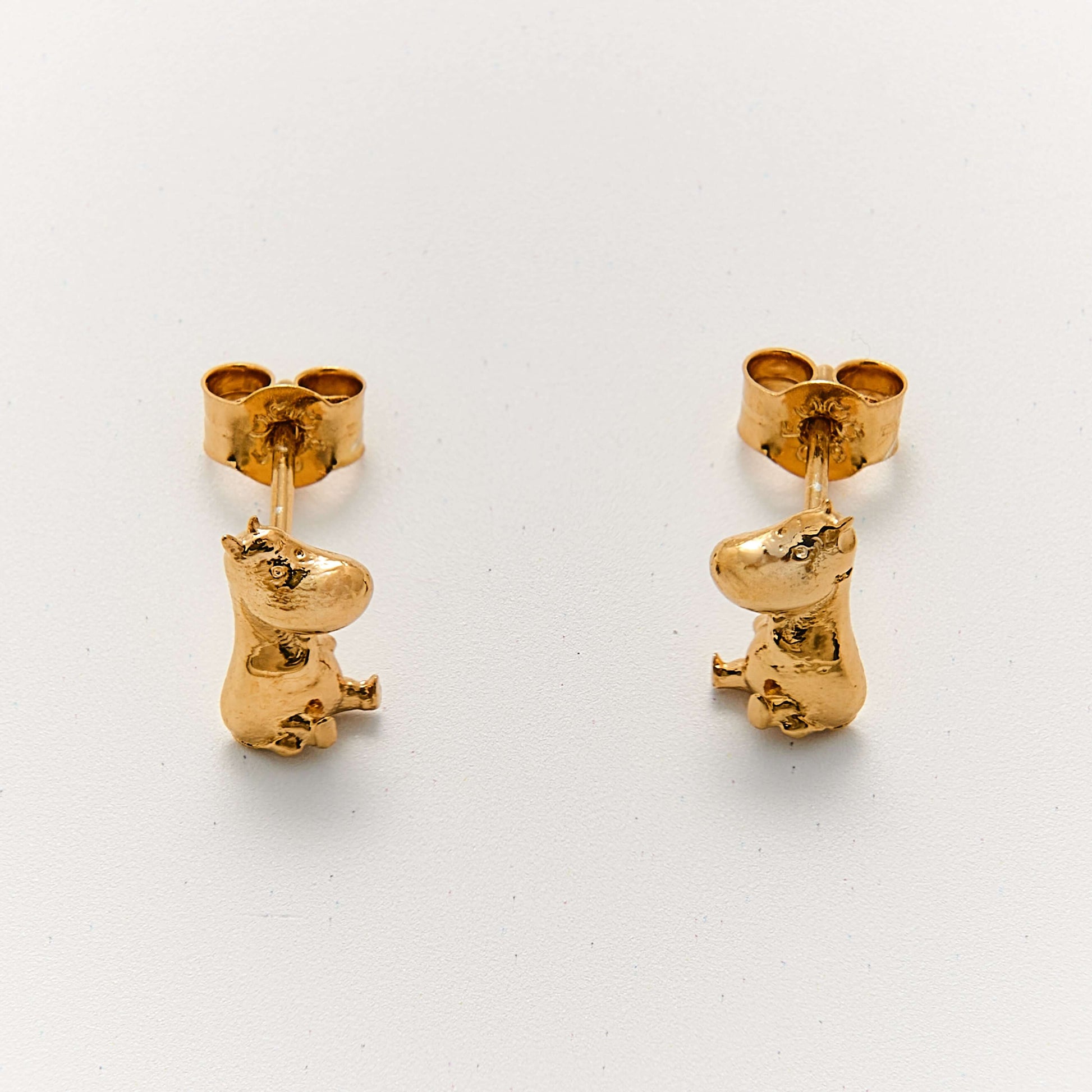 Close-up of Licensed To Charm Moomin Stud Earrings in 18ct gold vermeil showing Moomintroll and Snorkmaiden