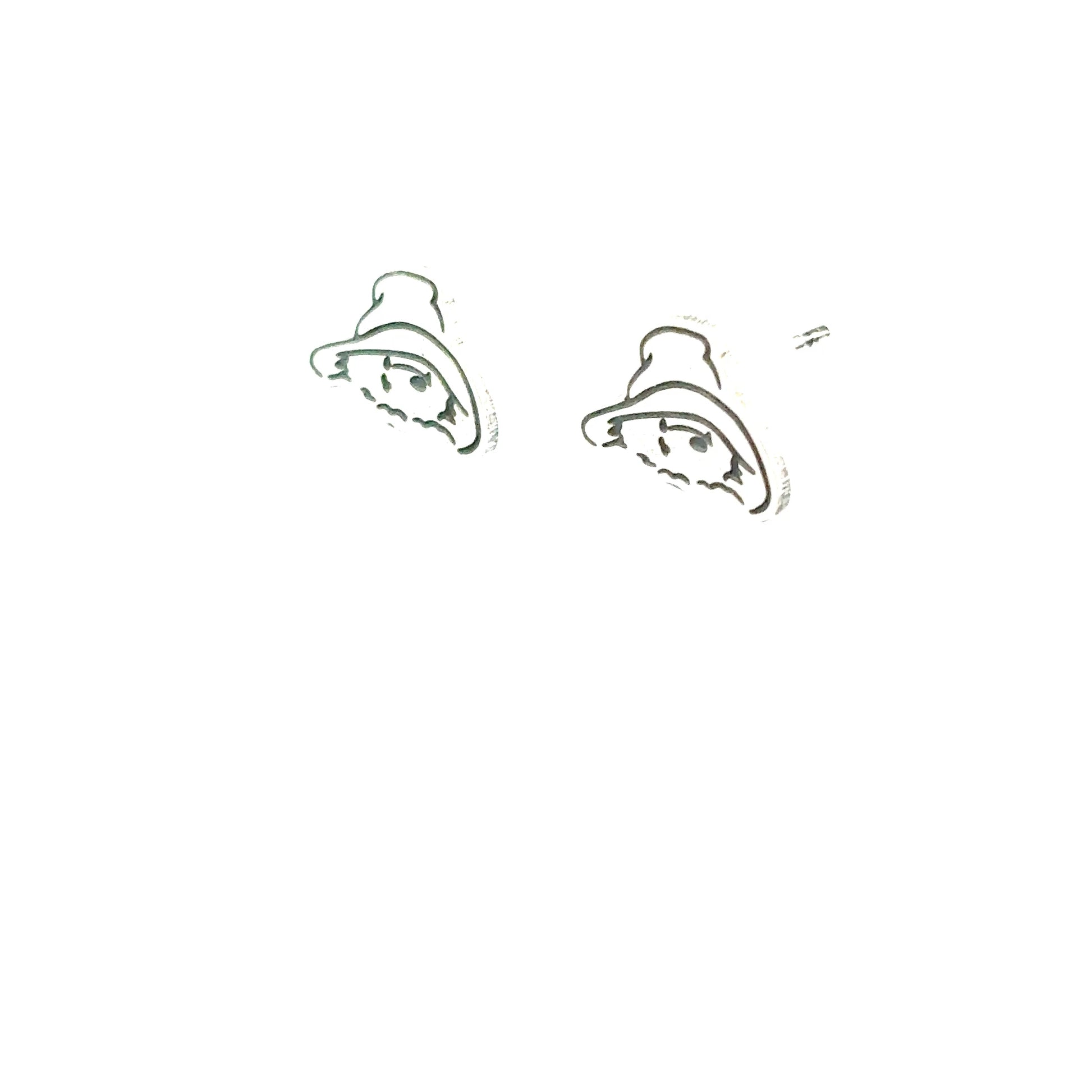 Licensed To Charm Close-up of Paddington head stud earring showing floppy hat and kind expression