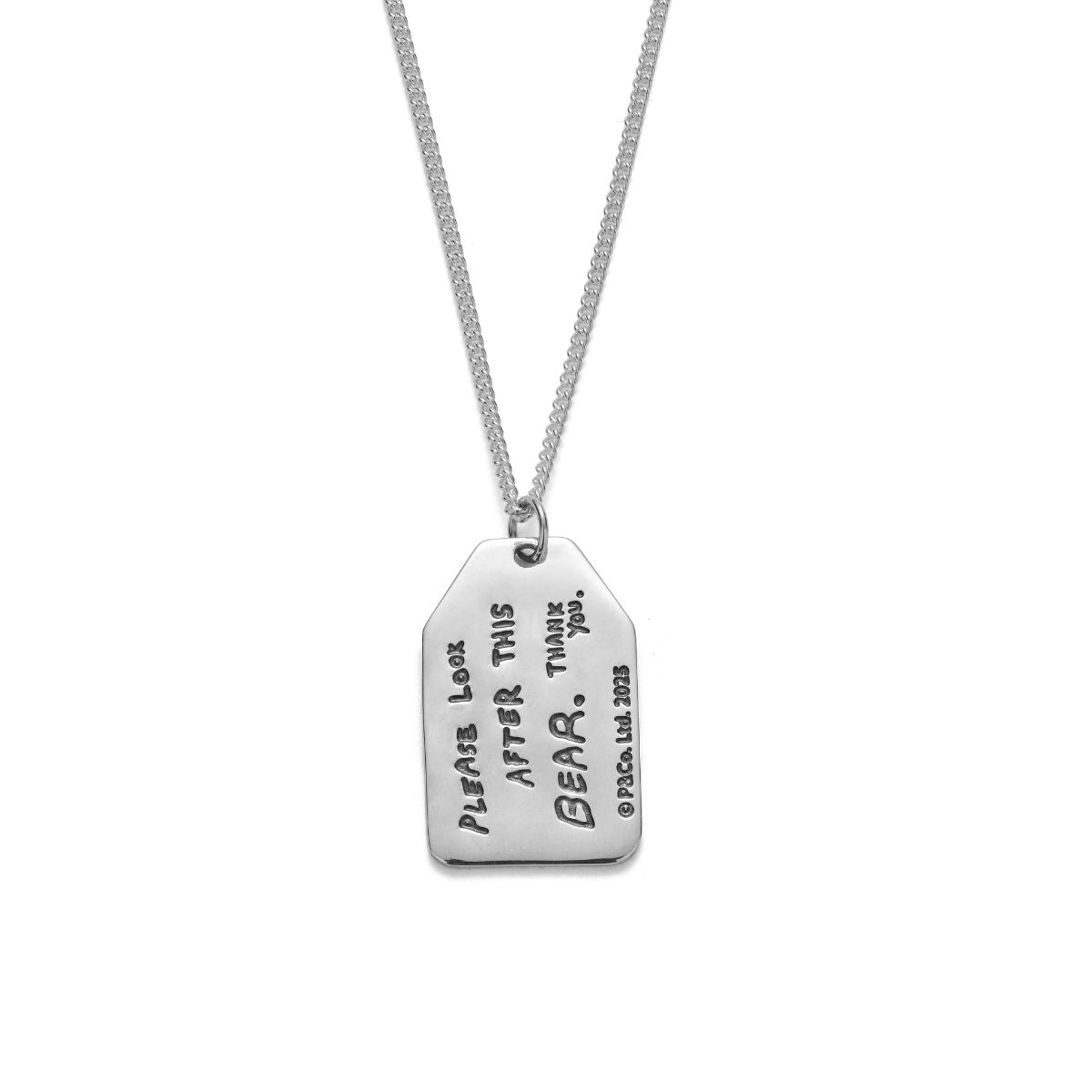 Licensed To Charm Paddington luggage tag pendant close-up, sterling-silver illustration side with oxidised detail