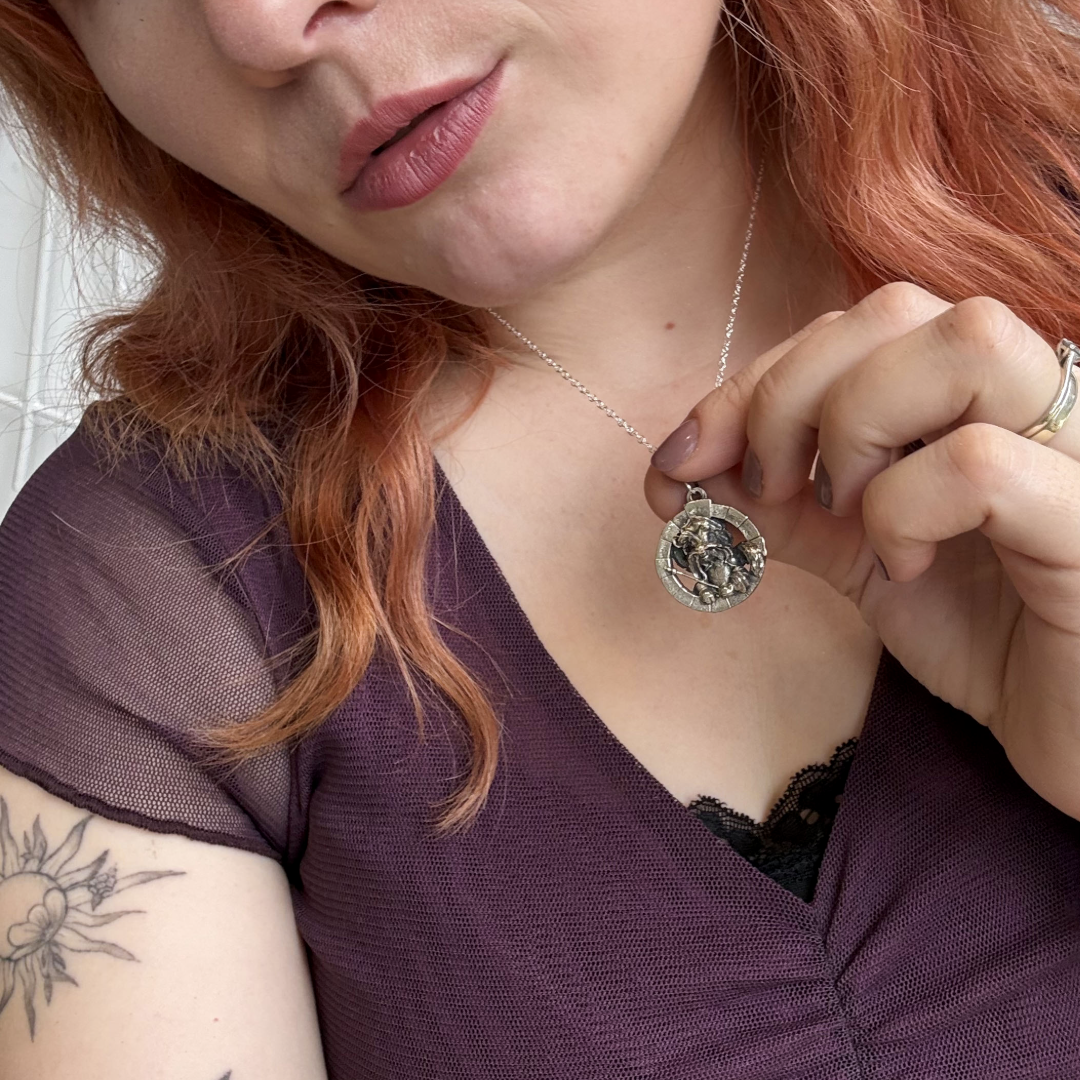 Model wearing Sir Didymus Labyrinth necklace, officially licensed handmade jewellery