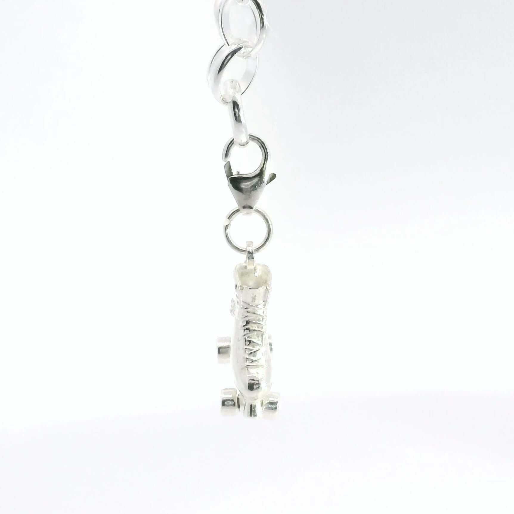 Licensed To Charm Starlight Express sterling silver bracelet with detailed roller skate charm and chain