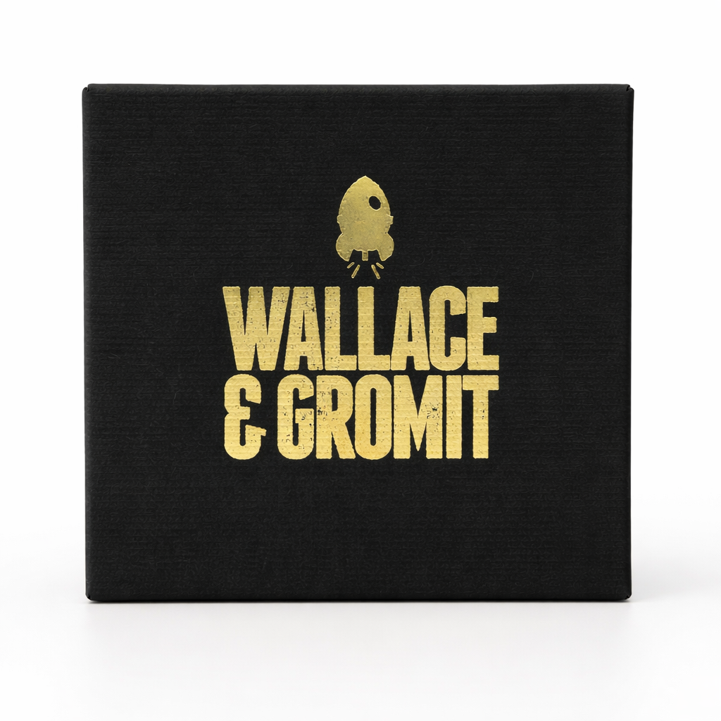 Wallace & Gromit branded gift box packaging by Licensed To Charm, black box with gold foil logo, front view