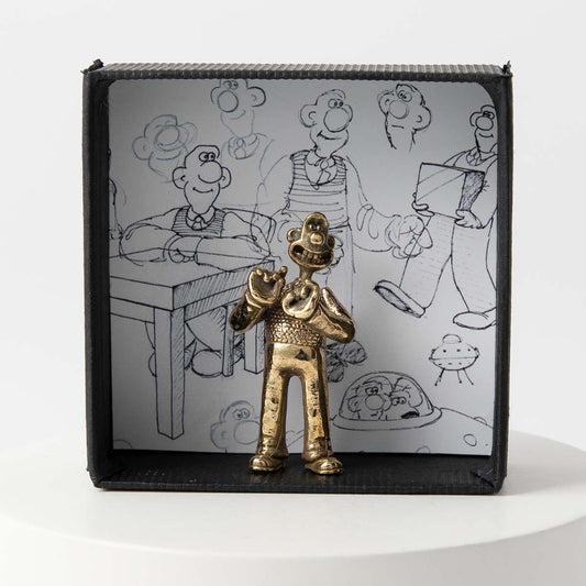 Licensed To Charm Bronze Wallace Figurine capturing the eccentric cheese-loving inventor from Wallace & Gromit. Packaged in a printed gift box