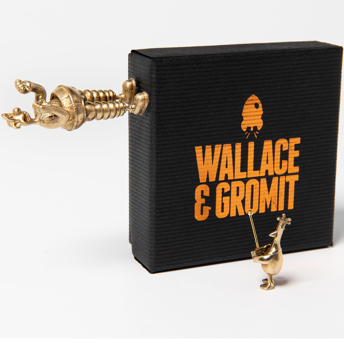 Licensed To Charm Wallace & Gromit Heist Collection packaging showing officially licensed Aardman bronze collectables