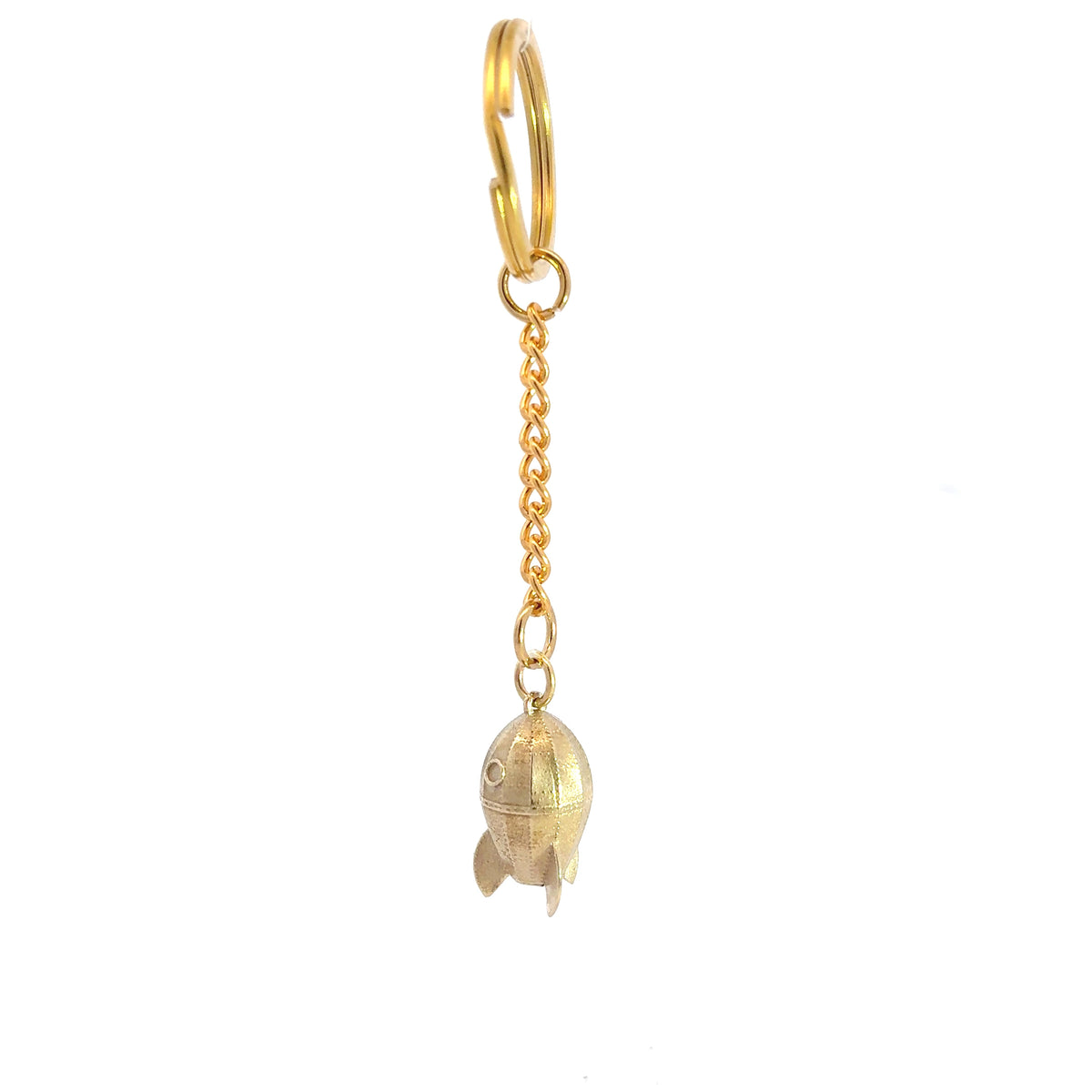 Licensed To Charm Wallace & Gromit Rocket brass bag charm from another side angle, showing the rocket’s curved body and fins