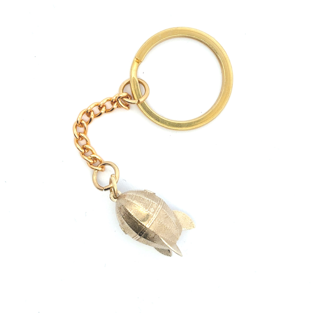Licensed To Charm Wallace & Gromit Rocket brass bag charm laid diagonally, showing the rocket, chain and round ring