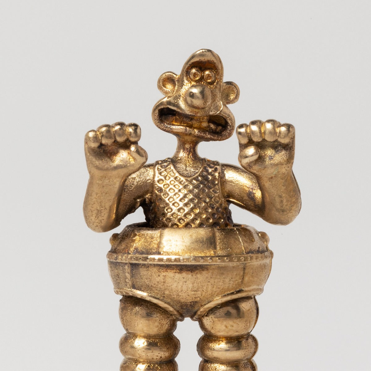 Licensed To Charm Wallace bronze miniature wearing Techno-Matic Trousers from Wallace & Gromit The Wrong Trousers close up