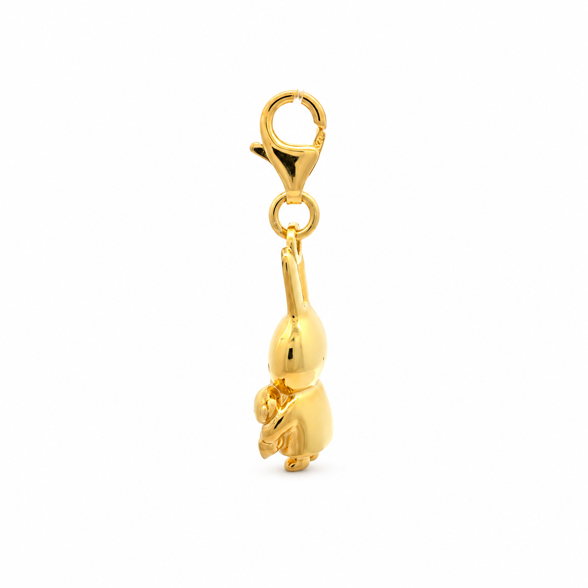 Side profile of the gold vermeil Miffy Holding Teddy clip-on charm showing the three-dimensional pendant and gold clasp fastening.