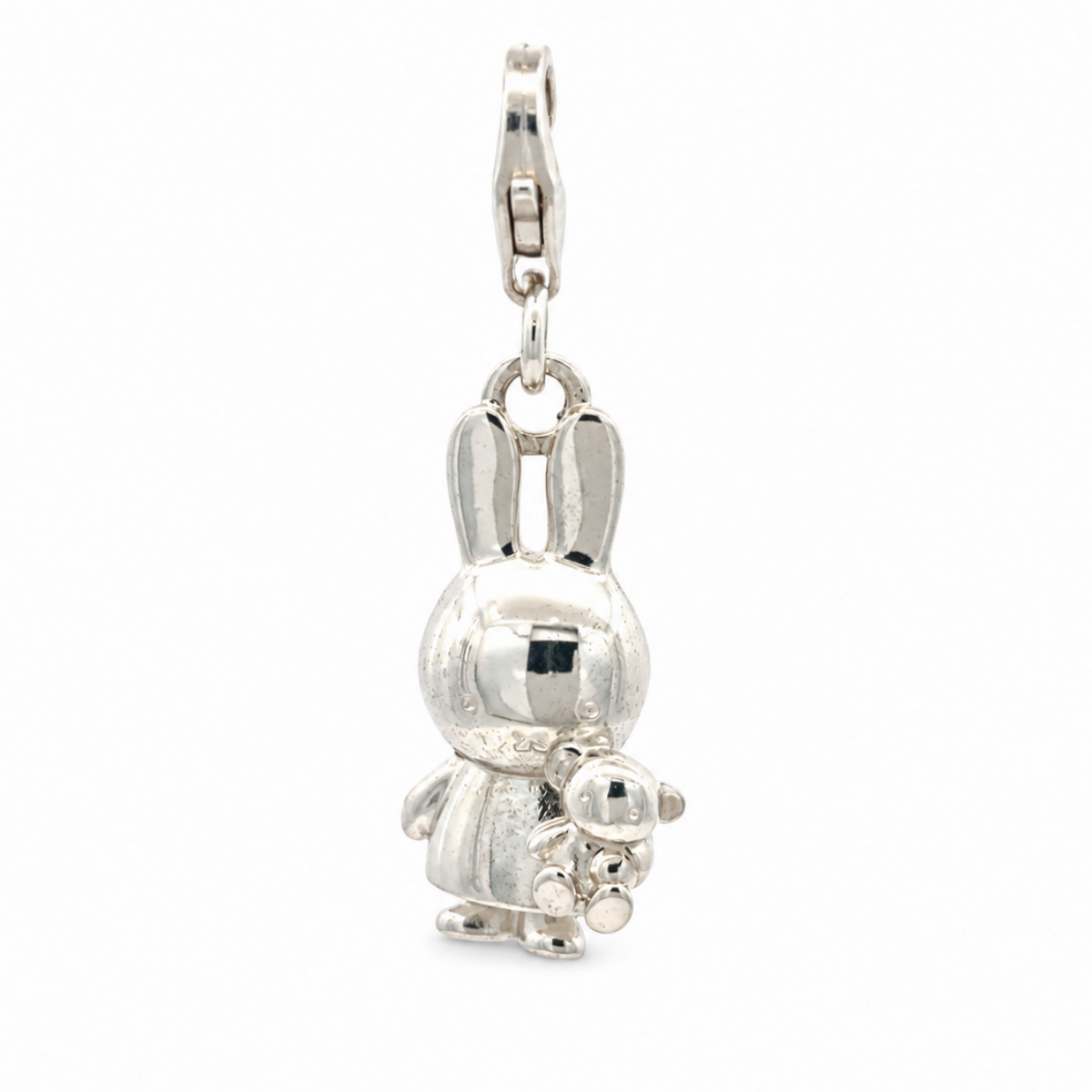 Close-up of the sterling silver Miffy Holding Teddy charm highlighting Miffy's long ears, sweet expression and miniature teddy bear.