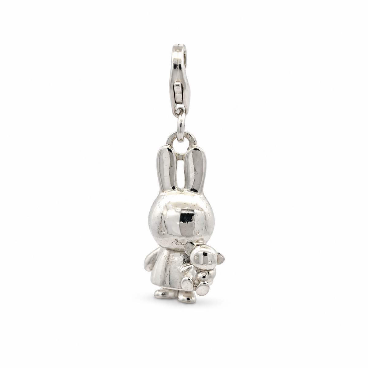 Miffy Holding Teddy clip-on charm in sterling silver, featuring a detailed 3D Miffy bunny cuddling her little teddy bear with a lobster clasp.