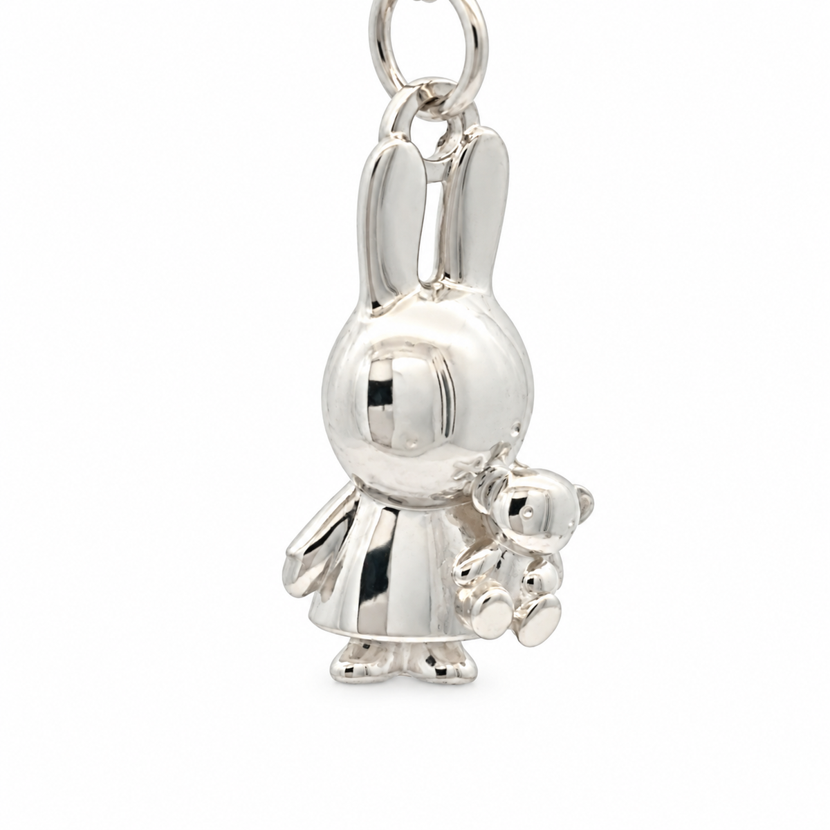 Sterling silver Miffy Holding Teddy Necklace featuring a detailed Miffy bunny pendant cuddling her little teddy bear on a silver chain close up