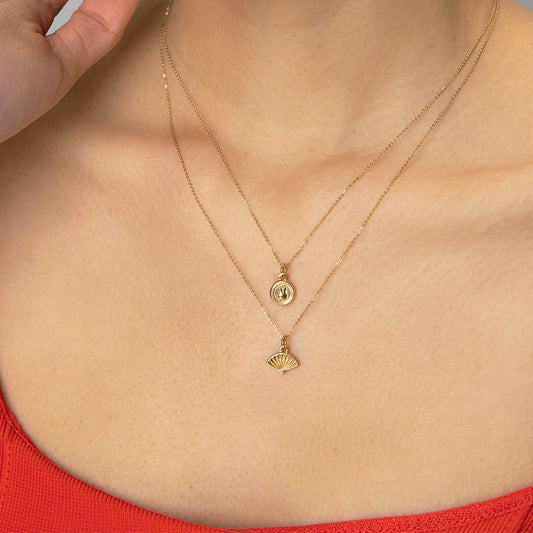 Miffy Mini Rabbit Mini Coin Necklace displayed on a neckline, highlighting the fine gold vermeil chain and dainty Miffy coin charm.