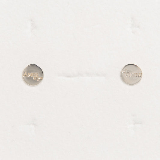 Close-up of the Amor et Virtute earrings in sterling silver, highlighting the delicate engraved lettering and polished finish.