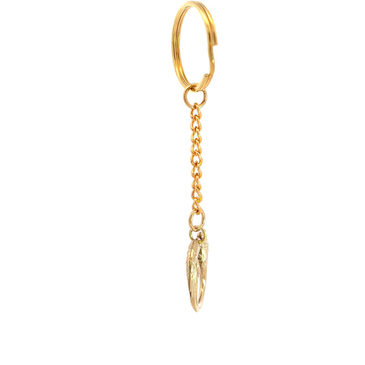 Official Jesus Christ Superstar gold plated bag charm inspired by the iconic musical logo side view