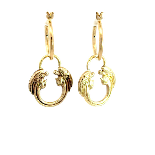 Official Jesus Christ Superstar gold hoop earrings inspired by the iconic Andrew Lloyd Webber musical logo.