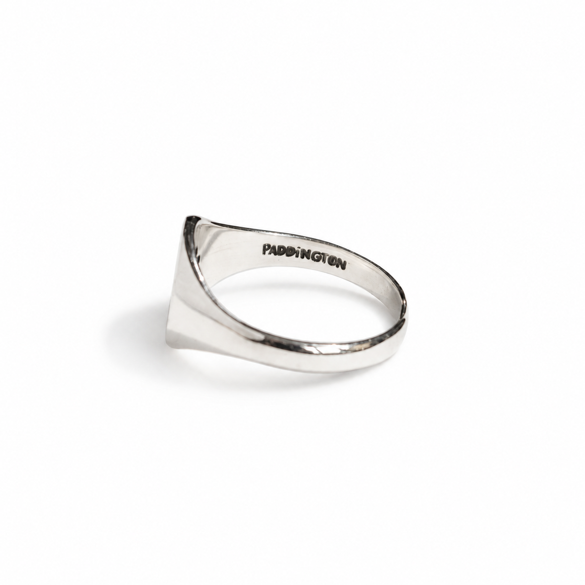 Rear view of the Paddington sterling silver signet ring showing its adjustable open band.