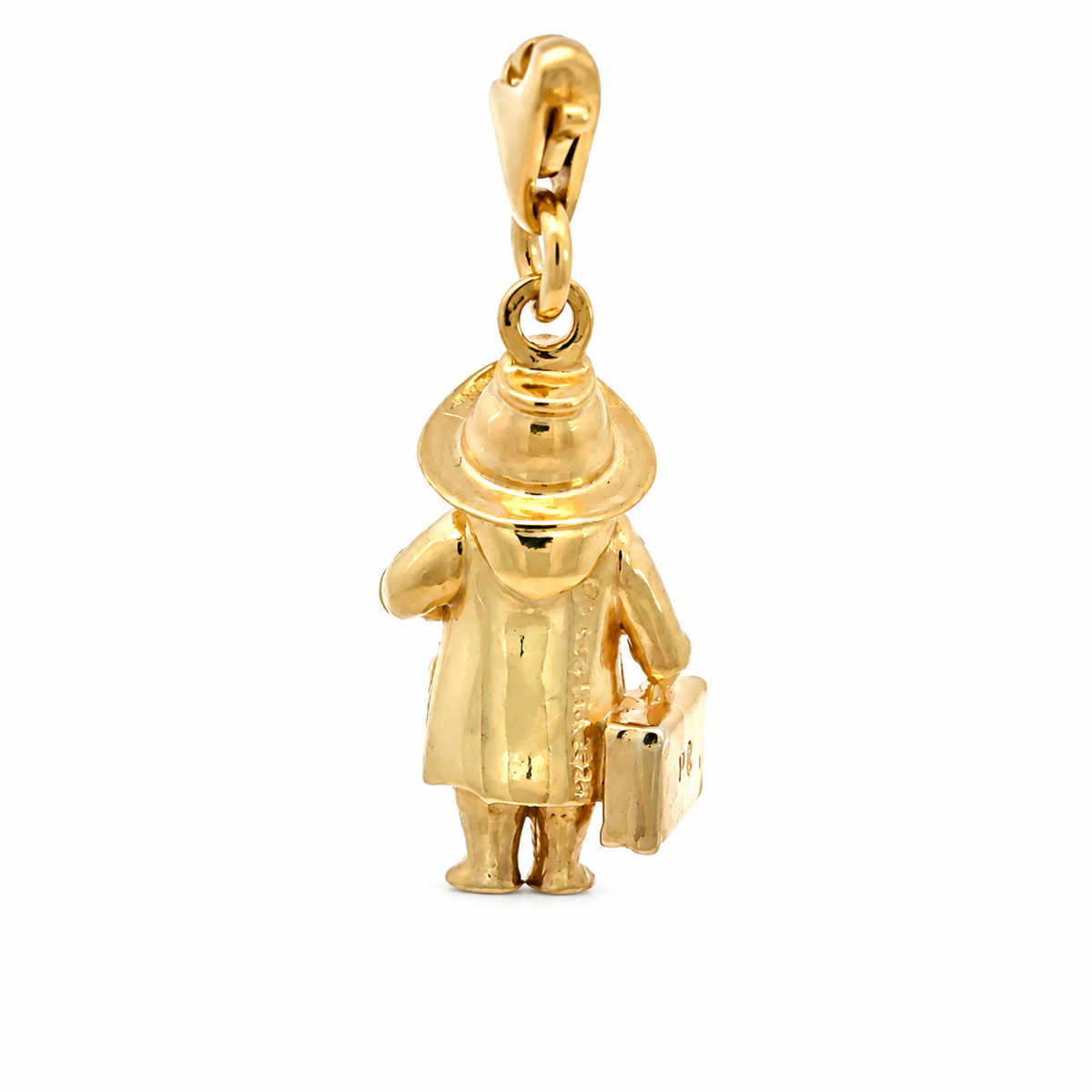 Front view of the gold vermeil Paddington clip-on charm showing his hat, duffle coat, miniature suitcase and marmalade jar.