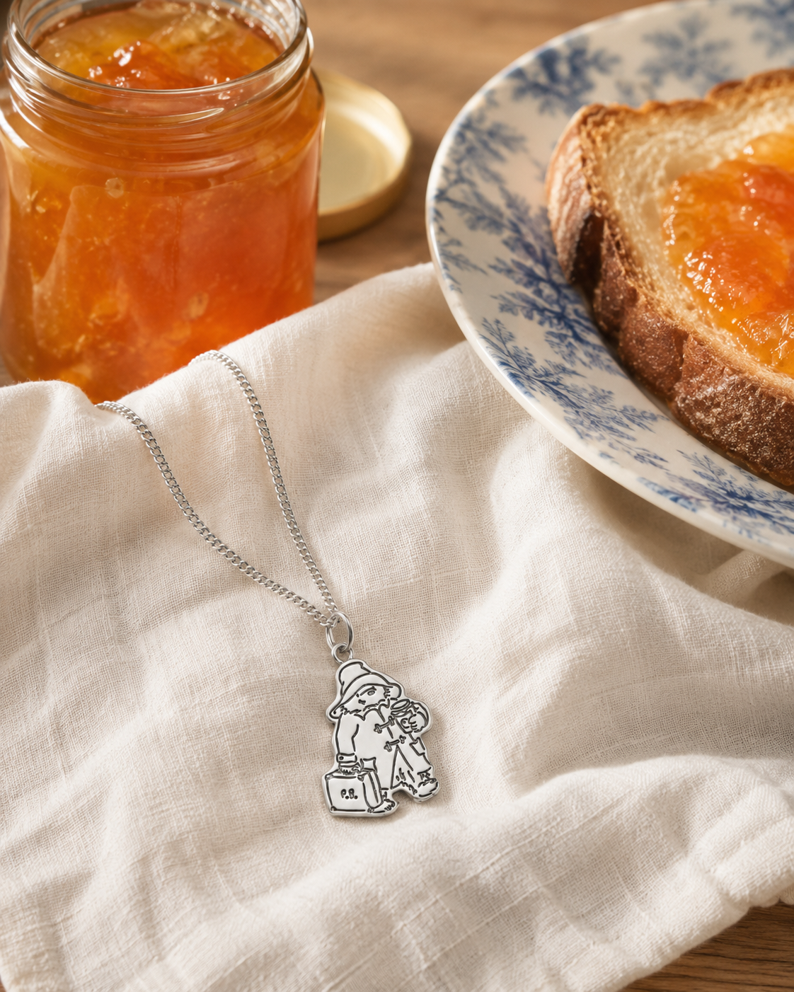 Licensed To Charm officially licensed Paddington sterling silver jewellery styled in a warm nostalgic lifestyle setting with marmalade toast.