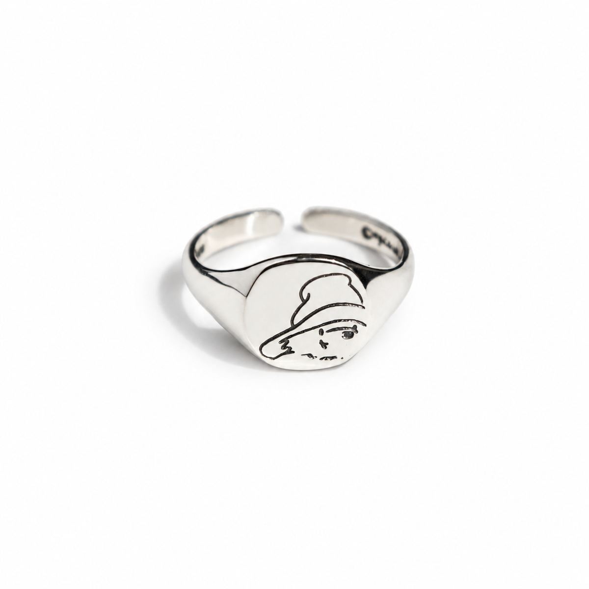 Officially licensed Paddington Bear adjustable signet ring in sterling silver, featuring an engraved Paddington face.