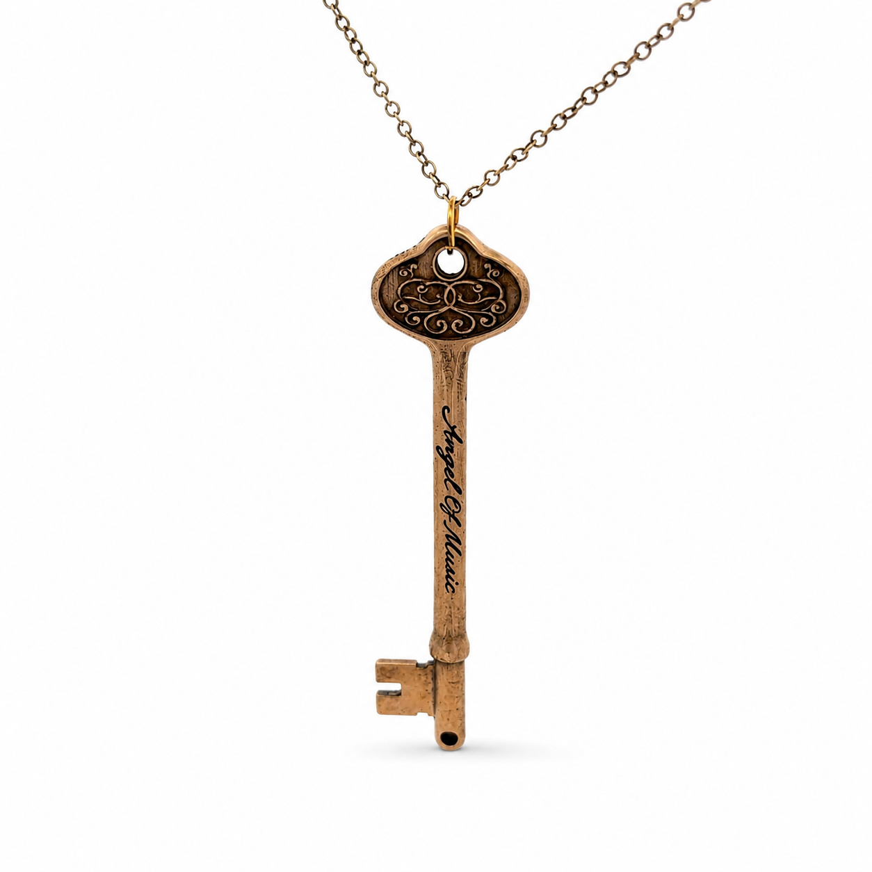 Phantom of the Opera bronze Angel of Music key necklace on an antique bronze chain, photographed on a white background.