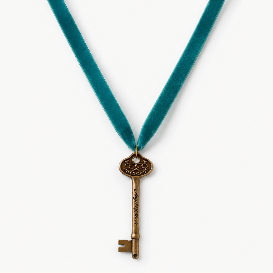 Phantom of the Opera bronze Angel of Music key necklace on a teal velvet ribbon