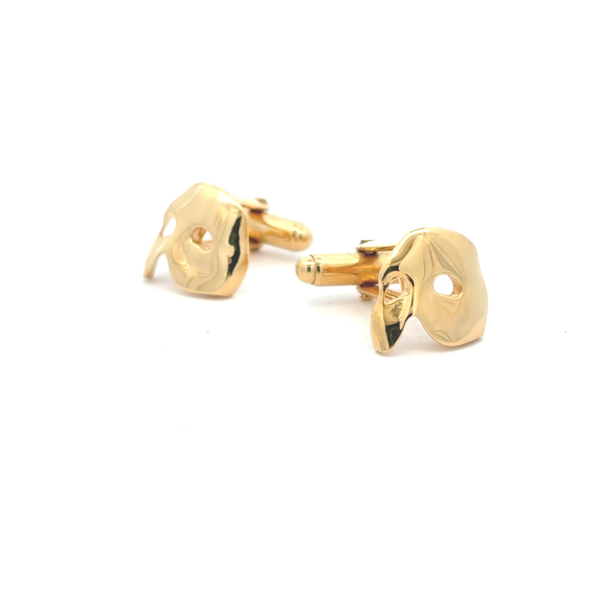 Licensed To Charm Close-up of gold vermeil Phantom mask cufflinks showing sculpted polished detail