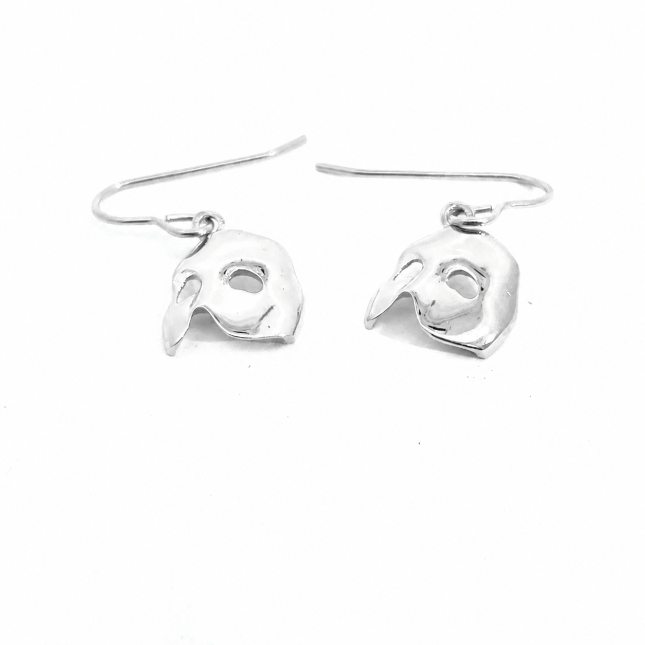 Close-up of The Phantom of the Opera sterling silver mask drop earrings with hook fittings