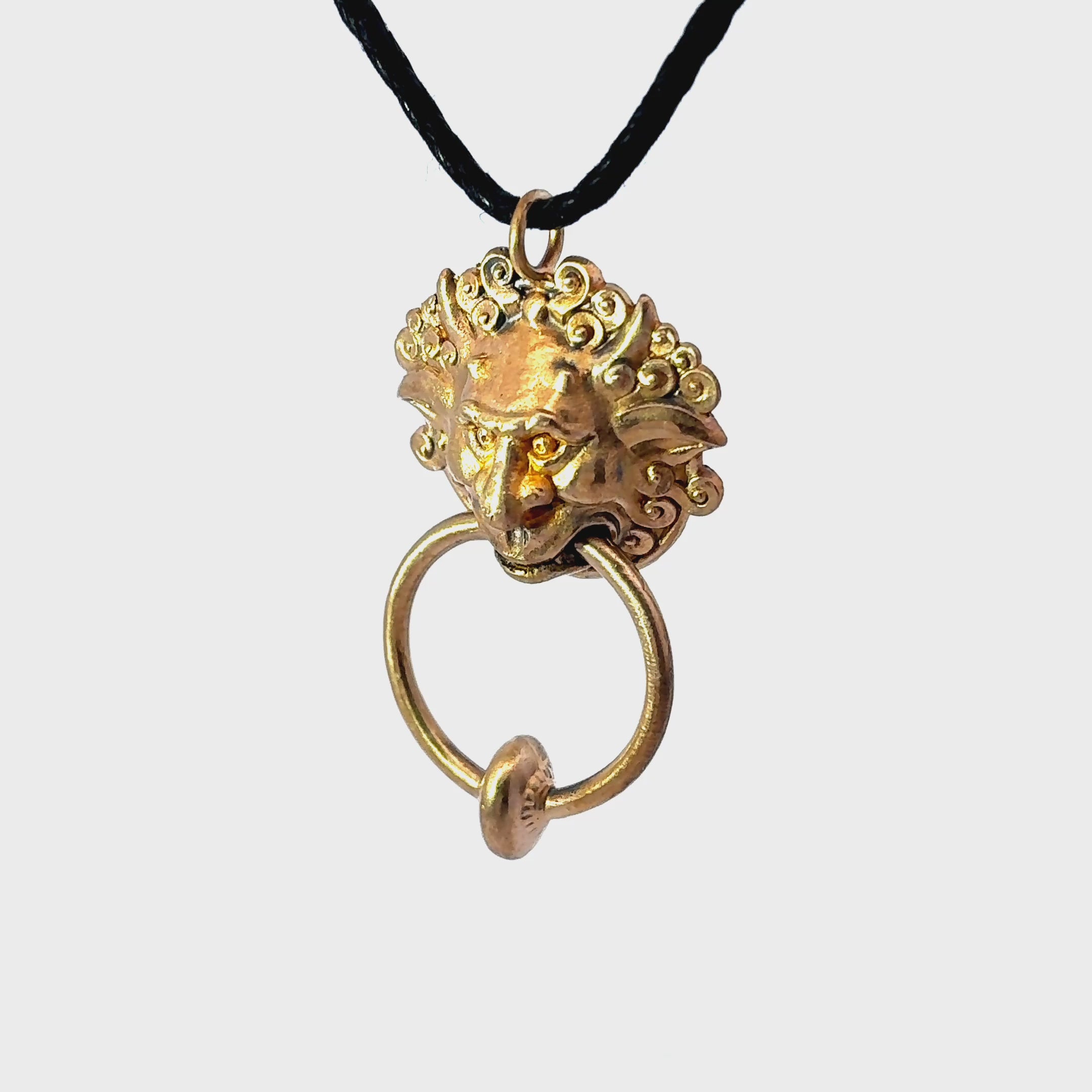 Licensed To Charm Labyrinth Left Door Knocker bronze necklace displayed for a 360-degree turnaround view