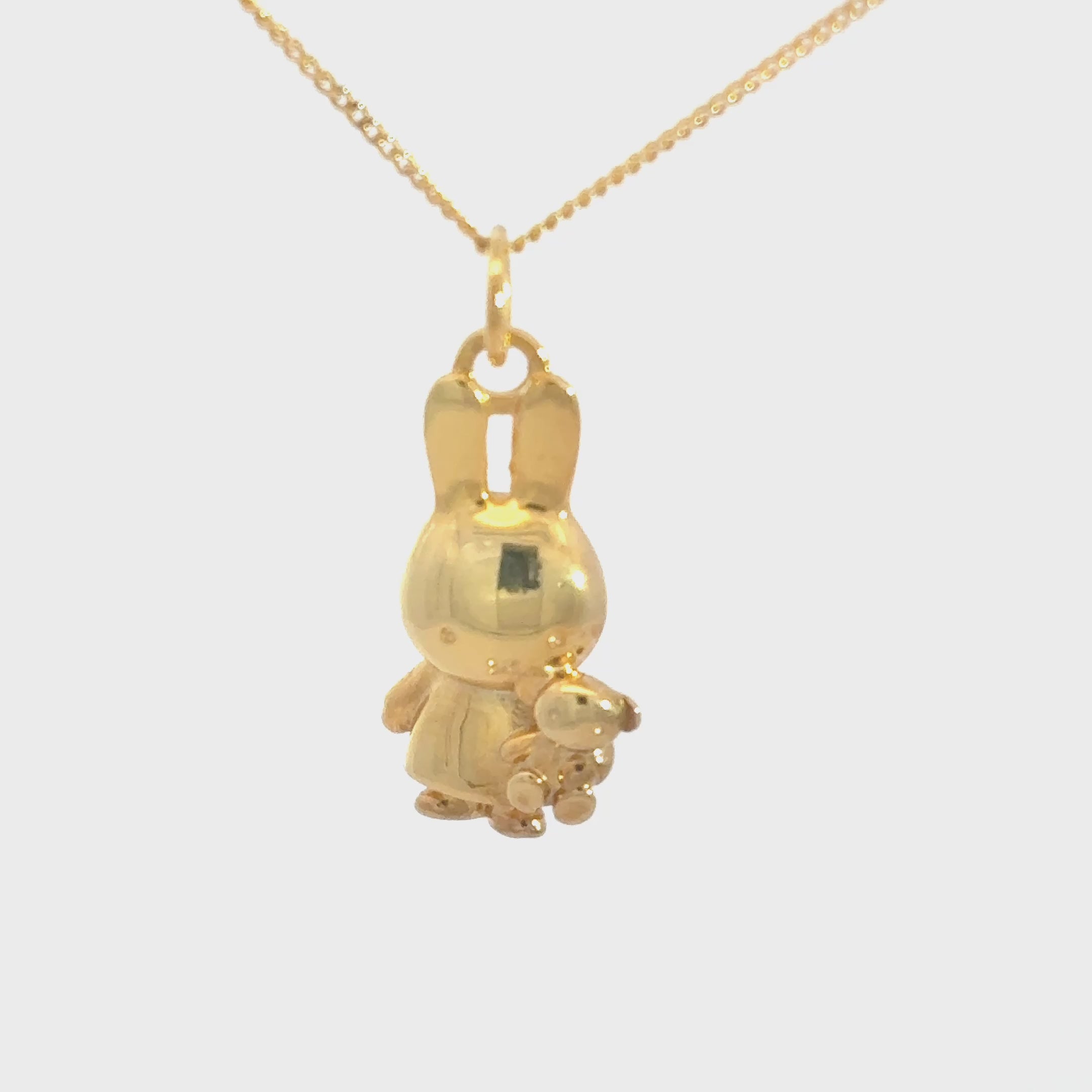 Video of the Miffy Holding Teddy Necklace in 18ct gold vermeil, showcasing the detailed 3D pendant and miniature teddy bear design.