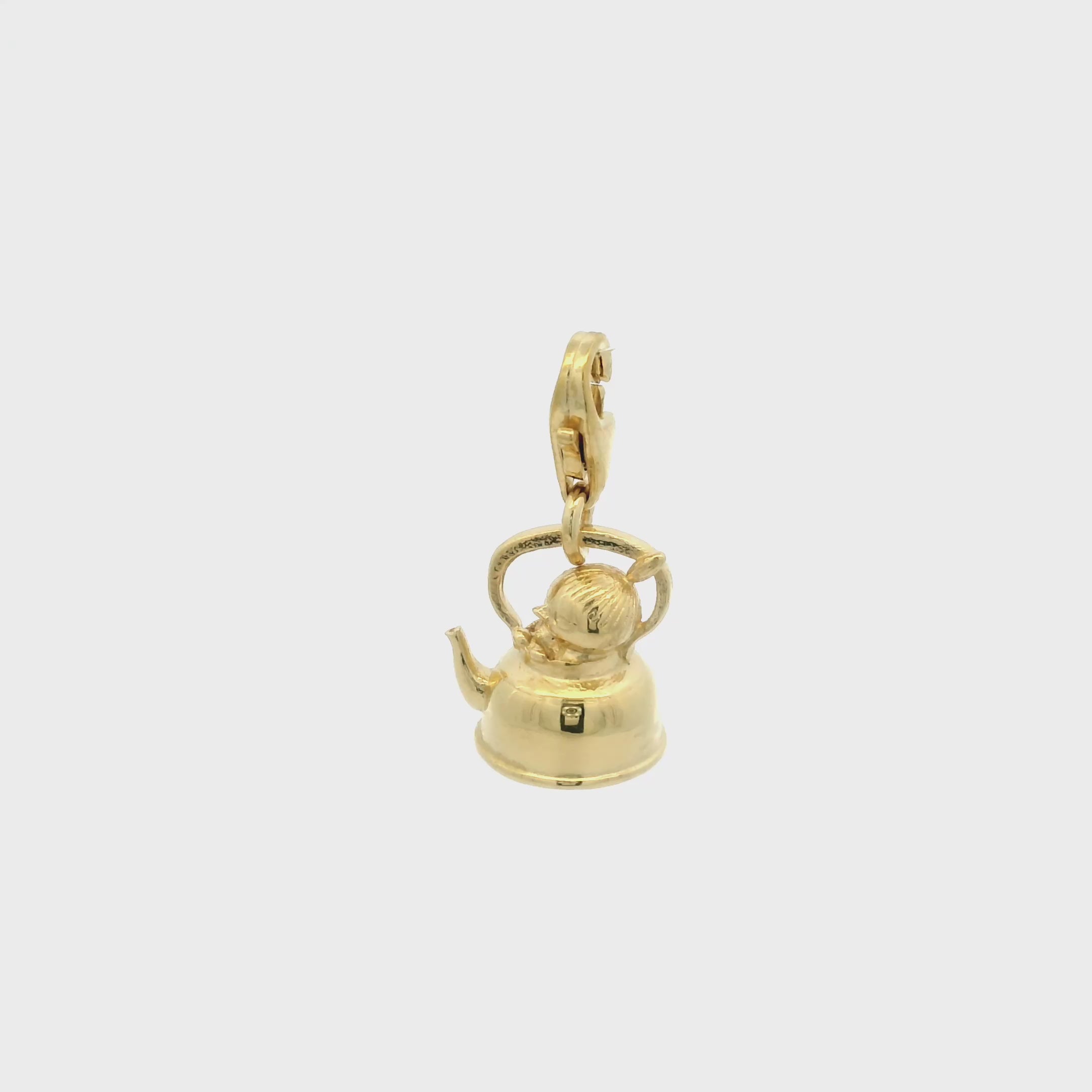 Back view of Little My gold charm showing the detailed teapot design and clip-on clasp, handcrafted in recycled silver with an 18ct gold vermeil finish
