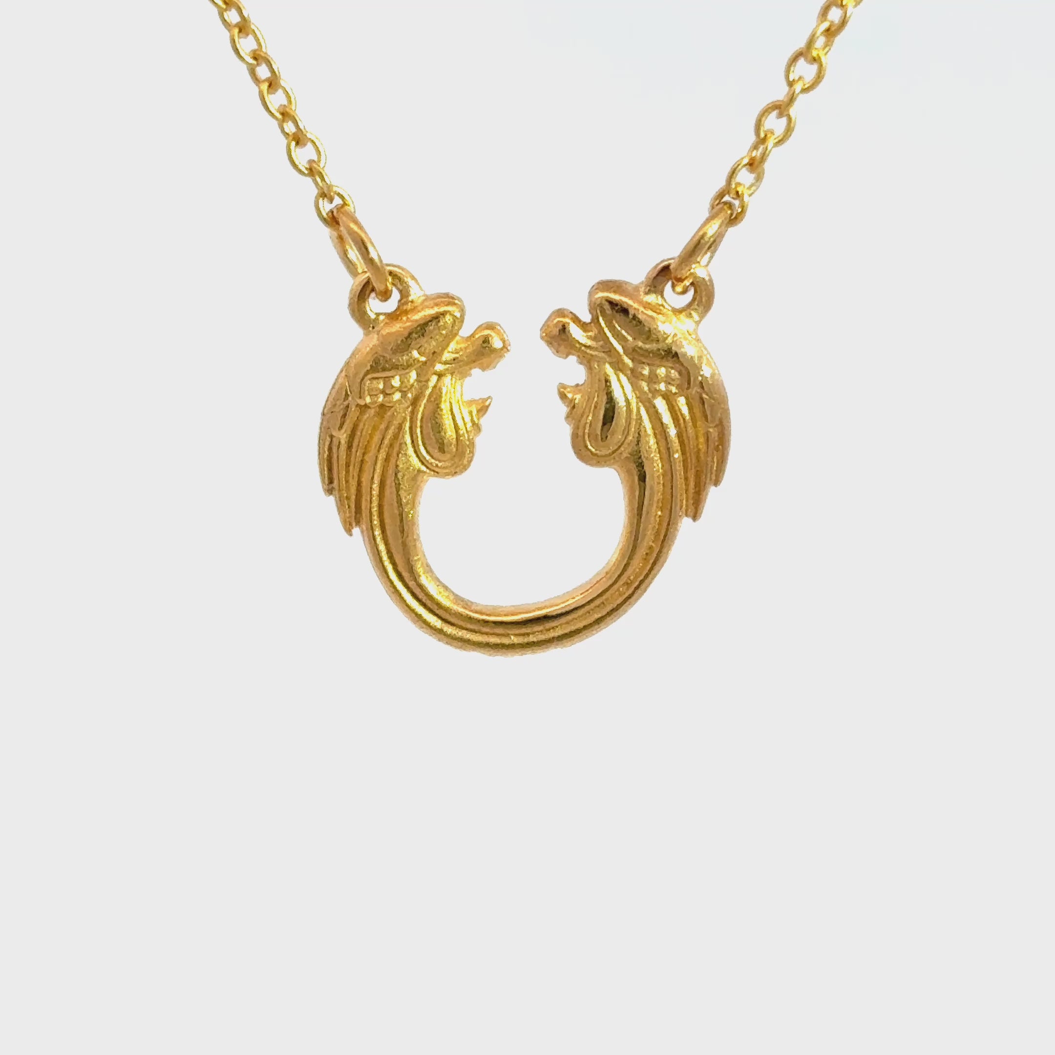 Jesus Christ Superstar gold plated necklace shown in product video, official Andrew Lloyd Webber theatre gift