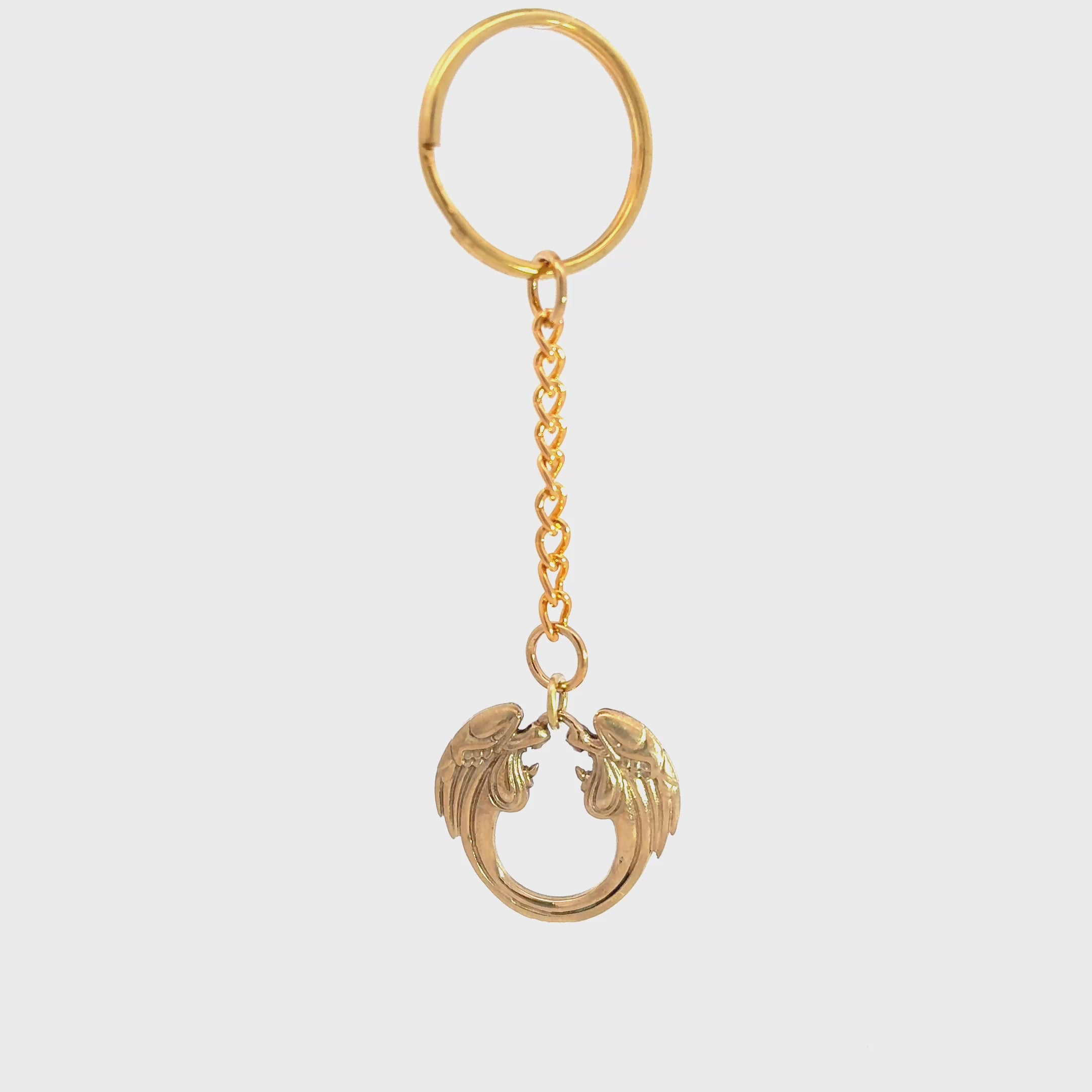 Official Jesus Christ Superstar gold plated bag charm inspired by the iconic musical logo turnaround video