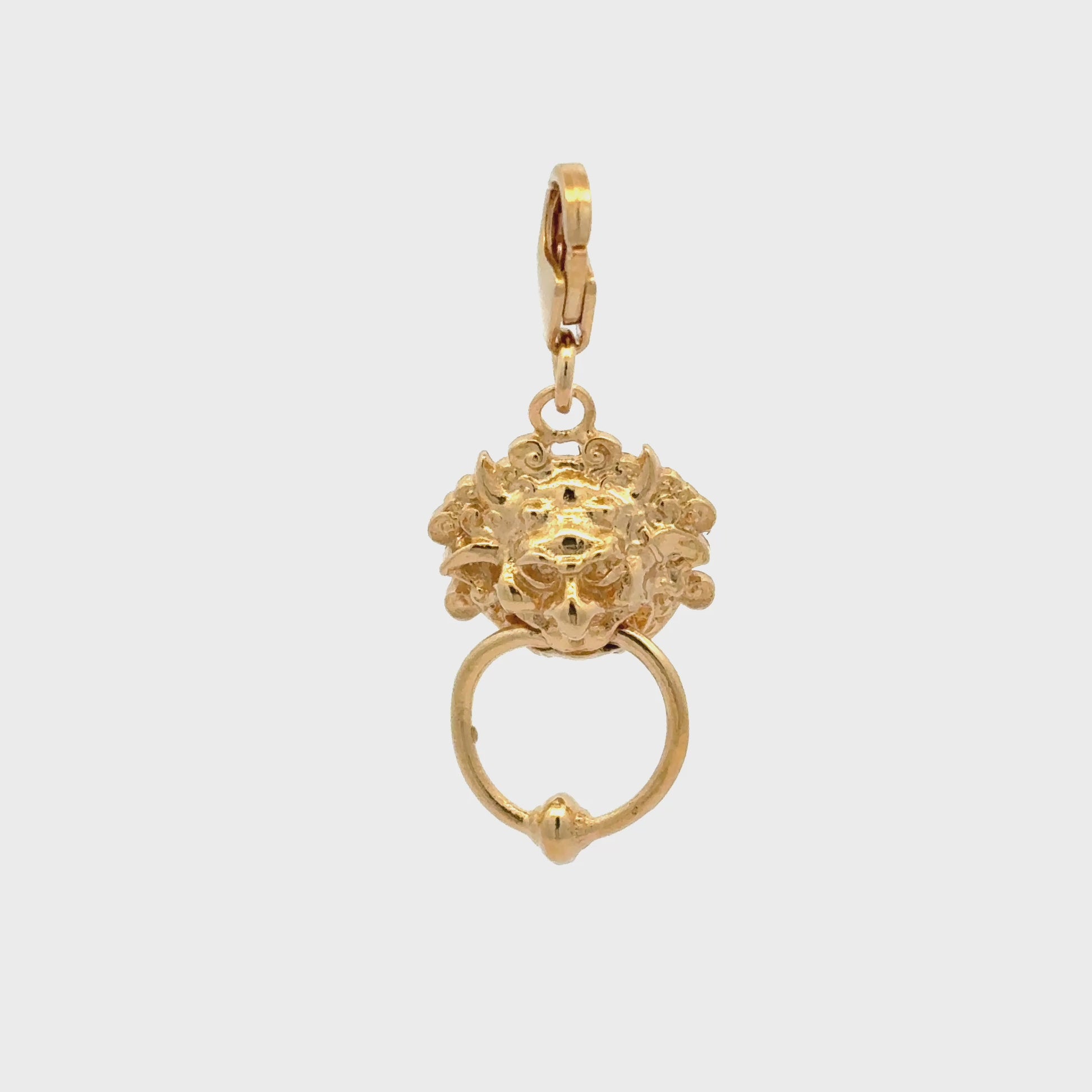 Licensed To Charm gold vermeil Labyrinth Left Door Knocker Charm – close-up 360 turnsround of the secure clip-on clasp and oxidised detailing that enhances the character’s expression.