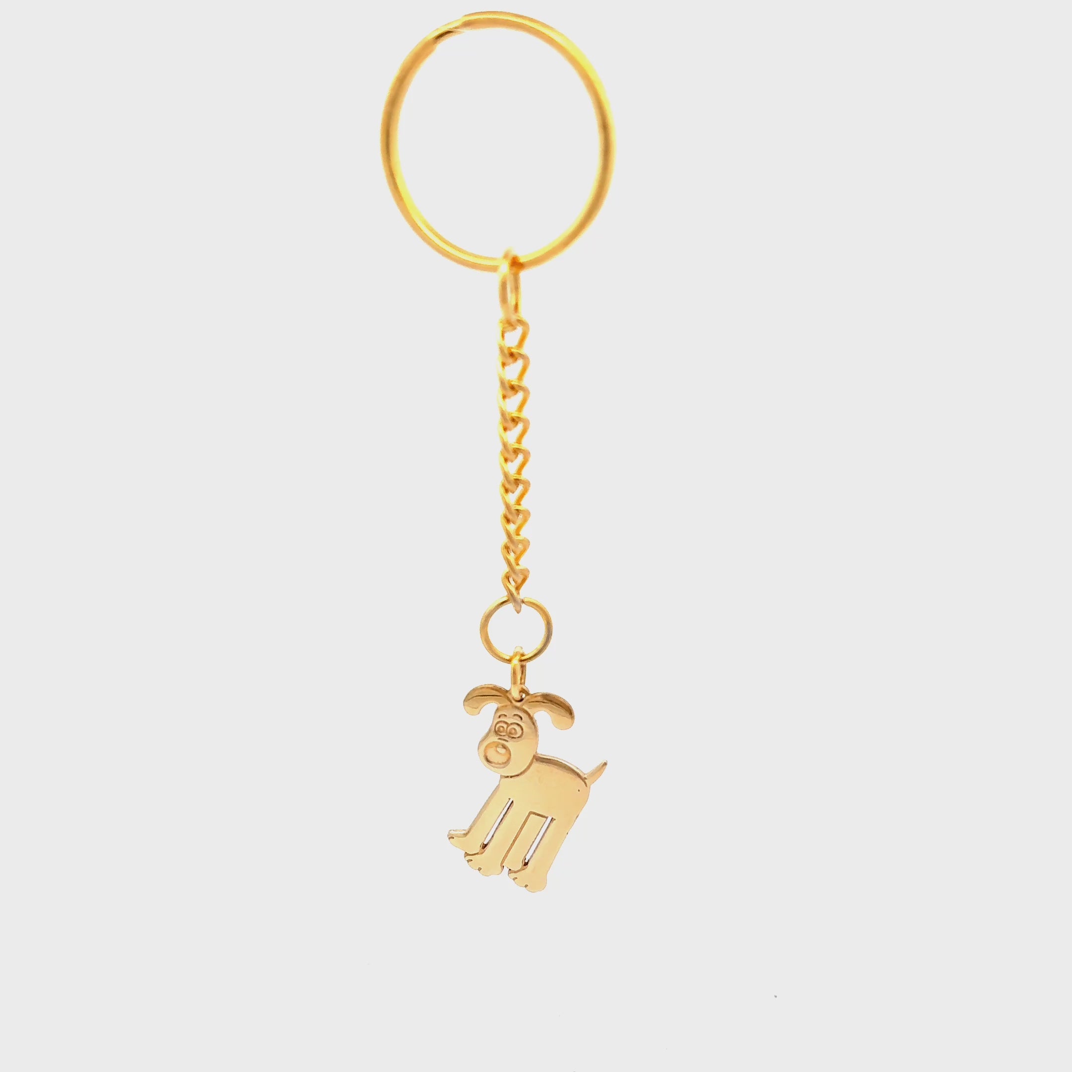 Gold Wallace & Gromit Gromit bag charm keyring turnaround video 