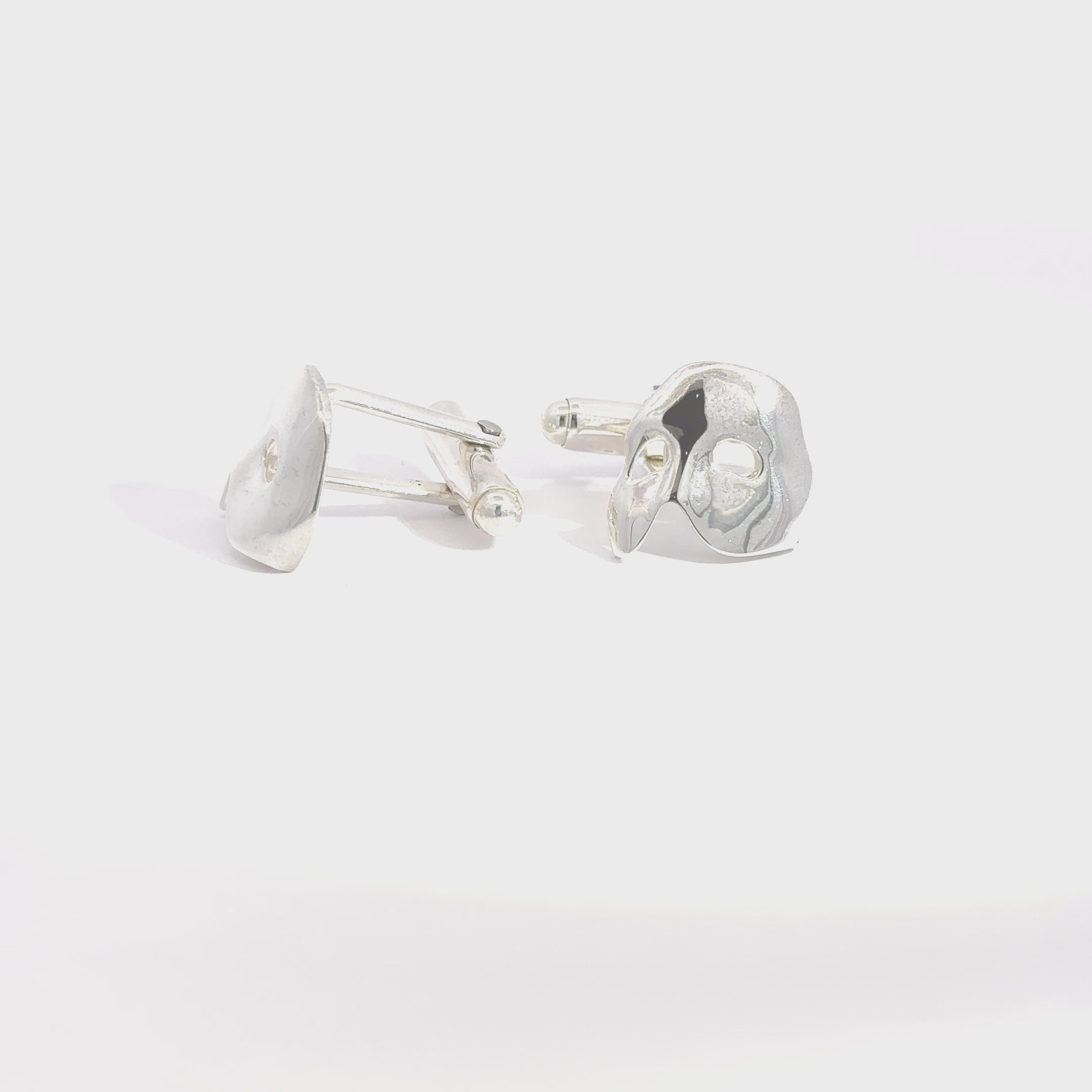 Handmade Phantom of the Opera Mask Cufflinks crafted from recycled sterling silver. A dramatic and thoughtful gift.