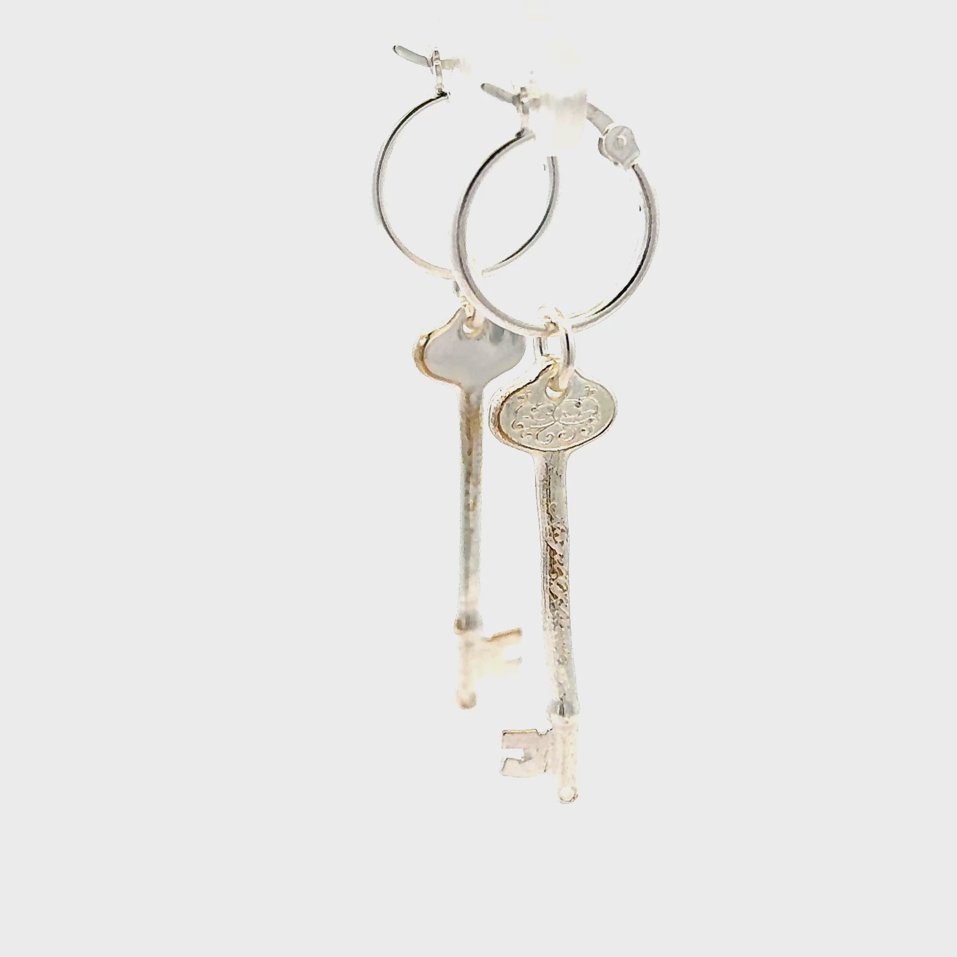 Licensed To Charm Phantom of the Opera key hoop earrings in sterling silver turnaround video, officially licensed and handmade in the UK