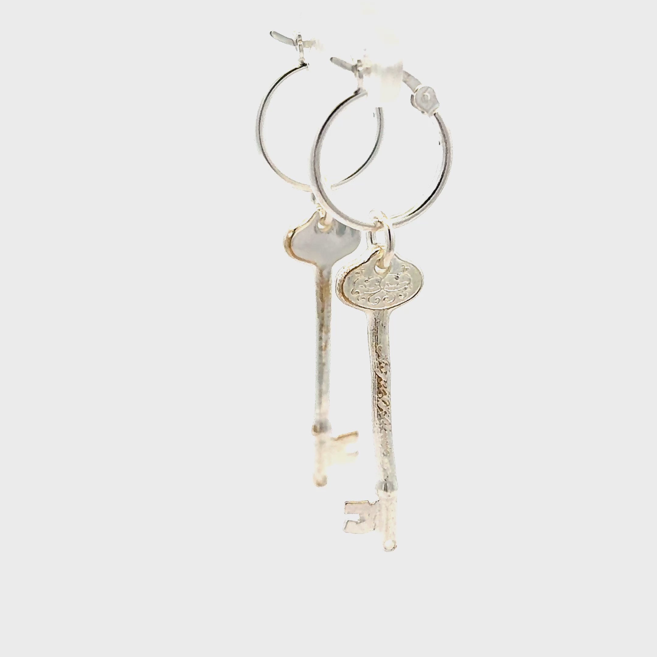 Licensed To Charm Phantom of the Opera key hoop earrings in sterling silver turnaround video, officially licensed and handmade in the UK