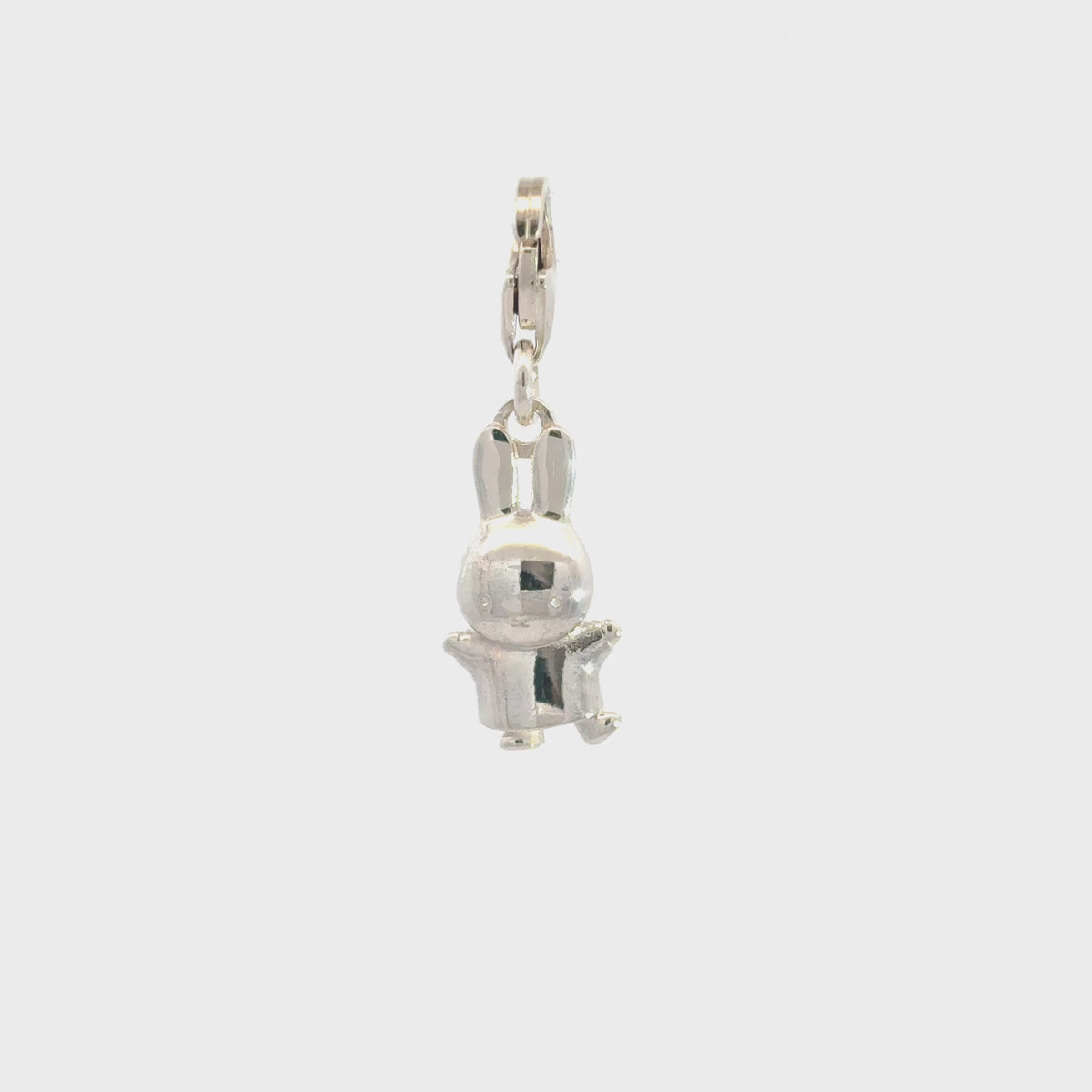 Video showcasing the Miffy Jumping Clip-On Charm in sterling silver, highlighting its three-dimensional design and playful pose.