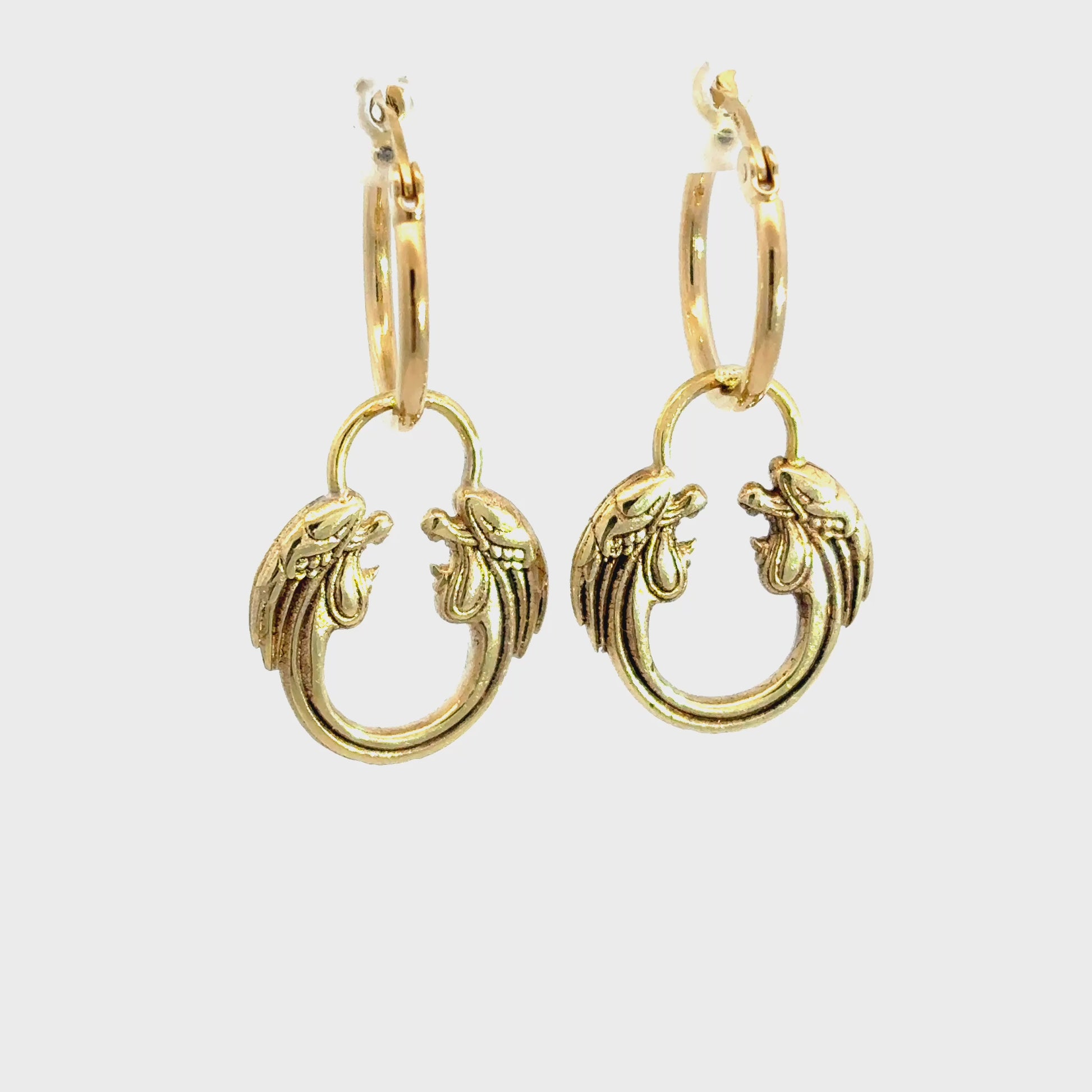 Jesus Christ Superstar gold plated hoop earrings shown in product video, official musical theatre gift for fans.
